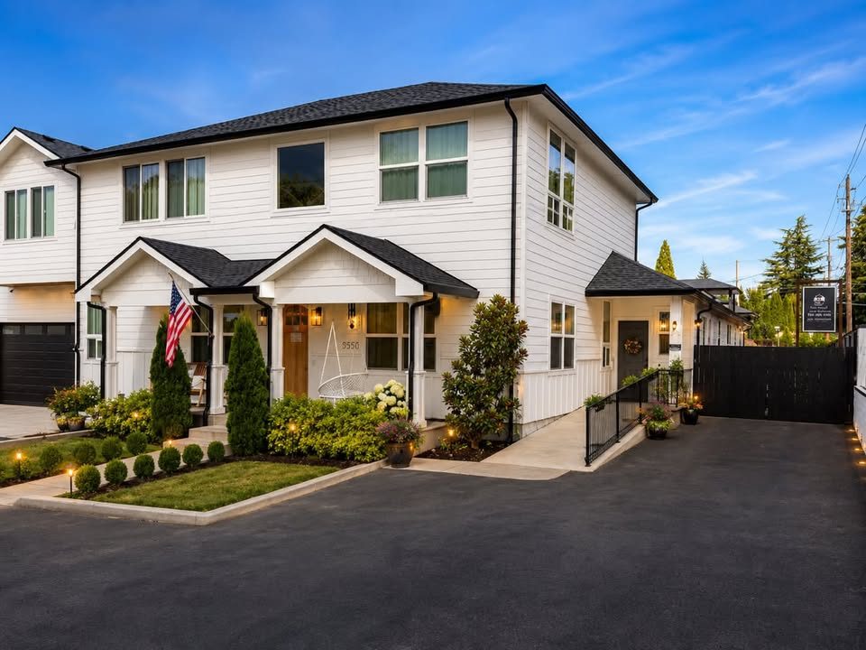 The two Tess' Adult Care Home houses in Milwaukie, Oregon, with landscaped front garden