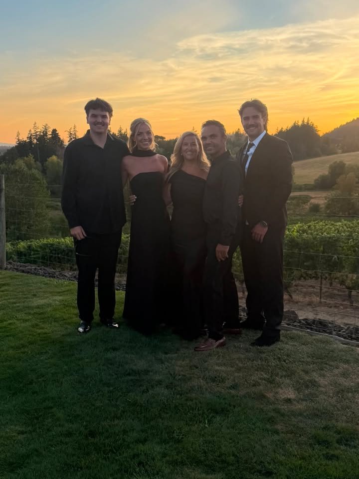 The family behind Tess' Adult Care Home together at sunset